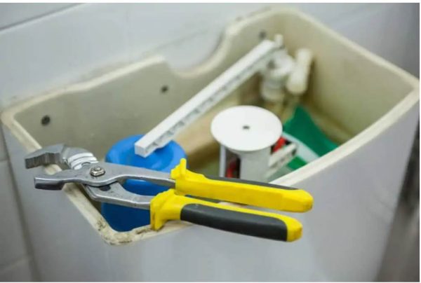 How To Remove A Stuck Plastic Lock Nut From A Toilet Tank